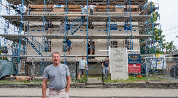 Jerry Kirby owner of Kirby Construction iin front of the Pitt's Head Tavern project in the Point neighborhood